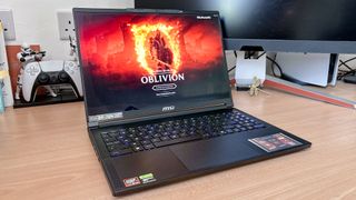 MSI Stealth A16 AI+ on desk with Oblivion Remaster on display
