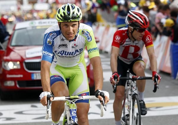 Ivan Basso leads Levi Leipheimer to the line.