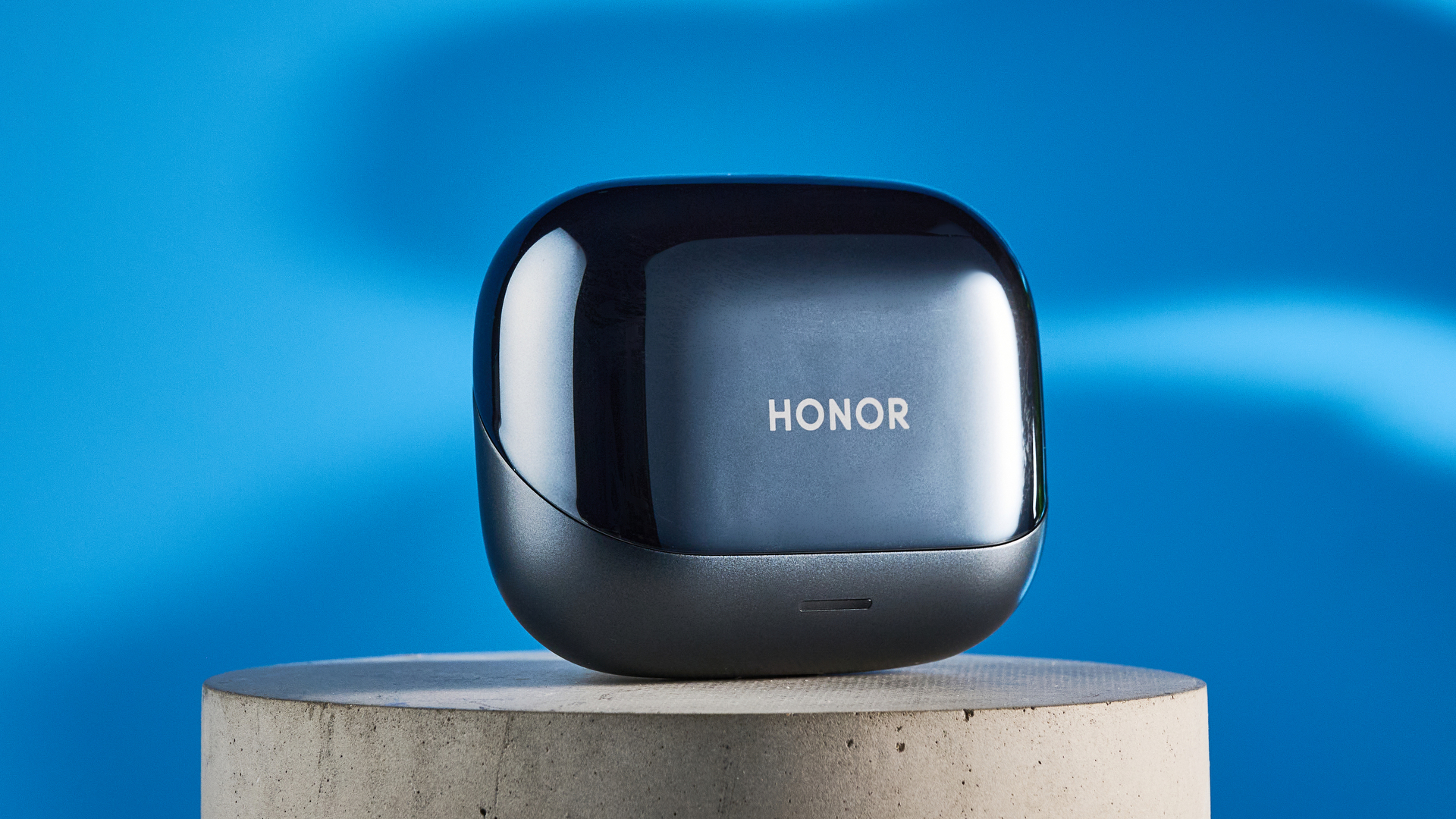 A pair of black Honor Earbuds 4 wireless earbuds