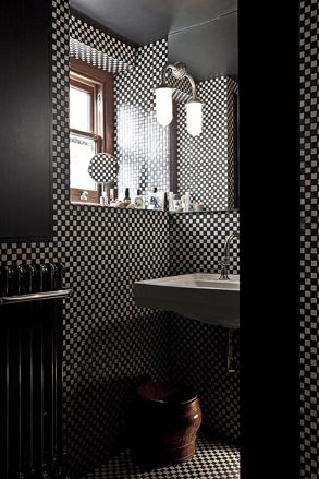Bathroom with mosaic tiles and painting the ceiling black