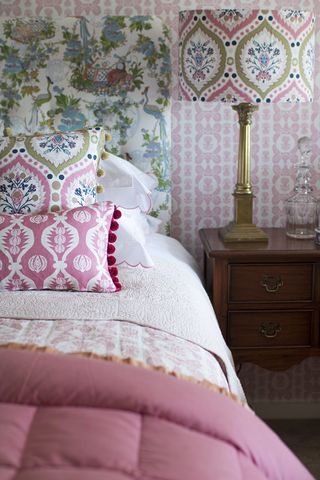 How to mix patterns – headboard, cushion and fabrics in a bedroom