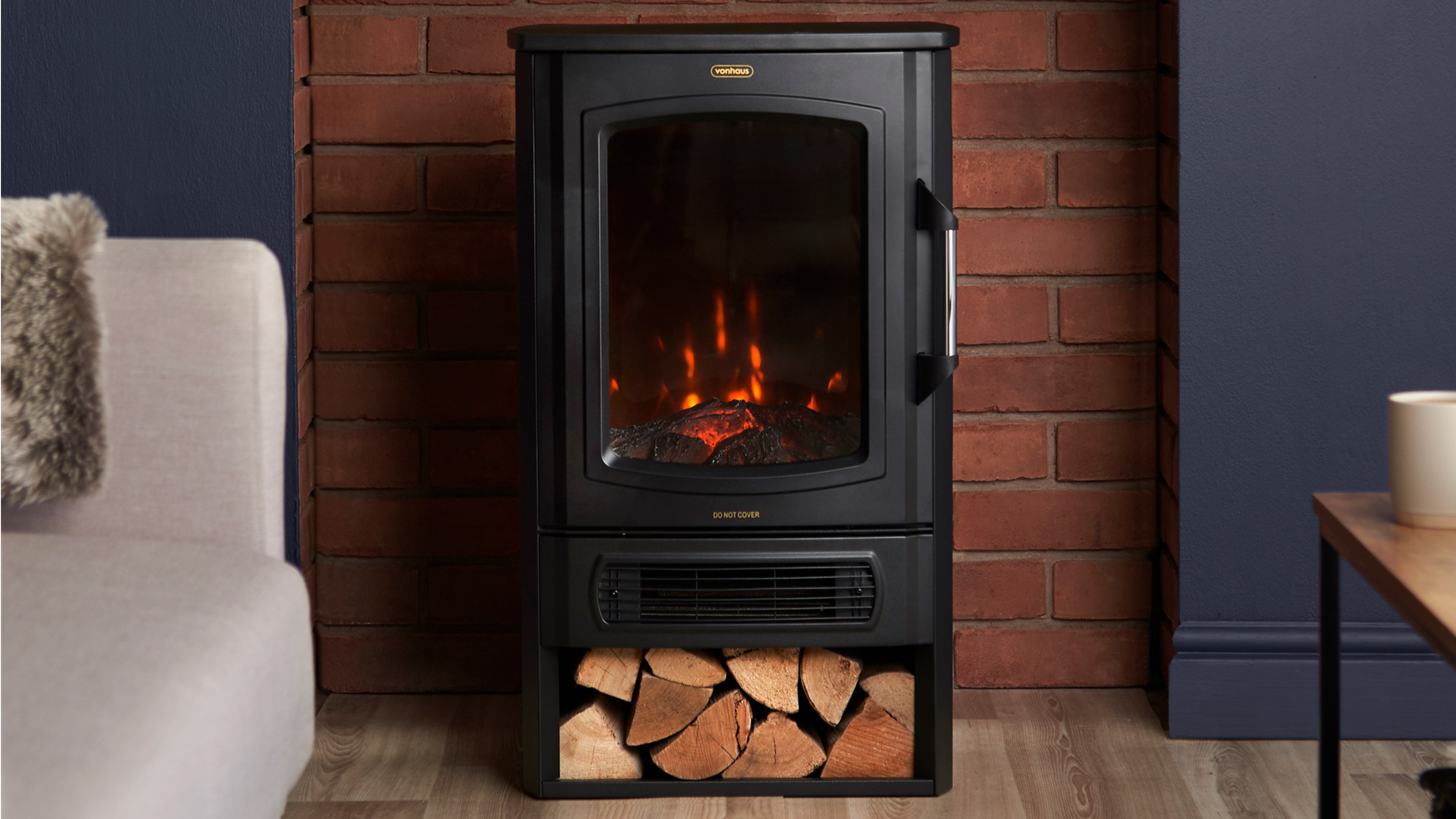 VonHaus Electric Stove &amp; Log Store installed in a fireplace