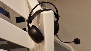 The Sony Inzone H9 II, positioned on a banister to show how it looks when worn