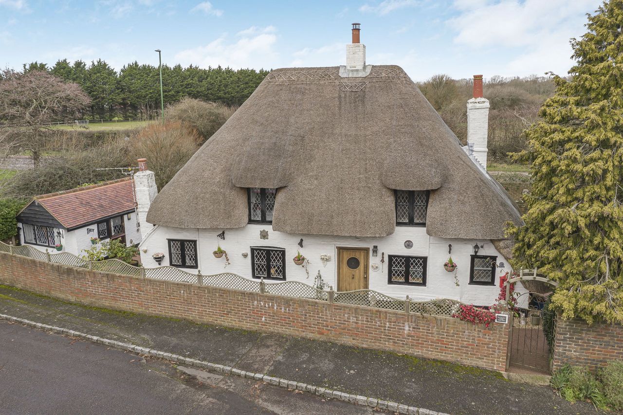 Images of the interiors and exteriors of The Thatched Cottage, Nutbourne
