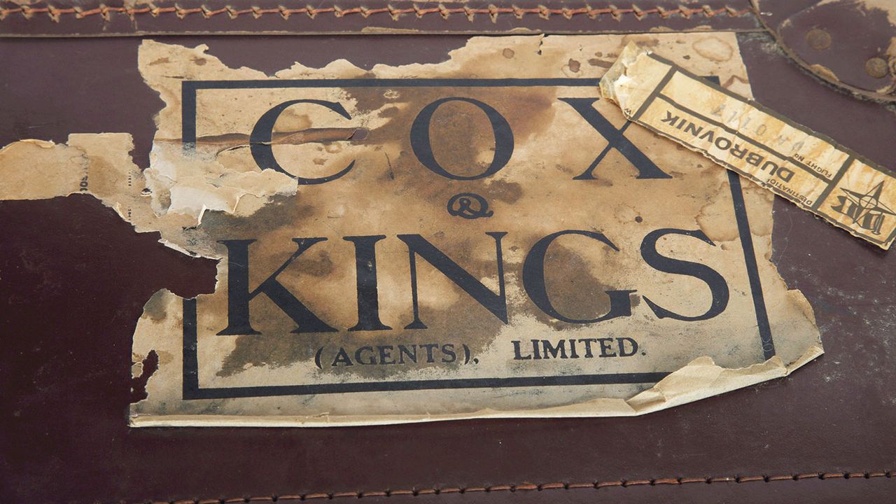 Cox &amp;amp; Kings battered suitcase