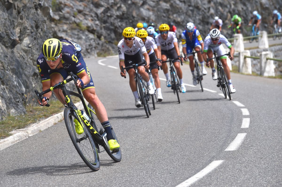 Jens Keukeleire (Orica-Scott) jumping away from the Sky led peloton