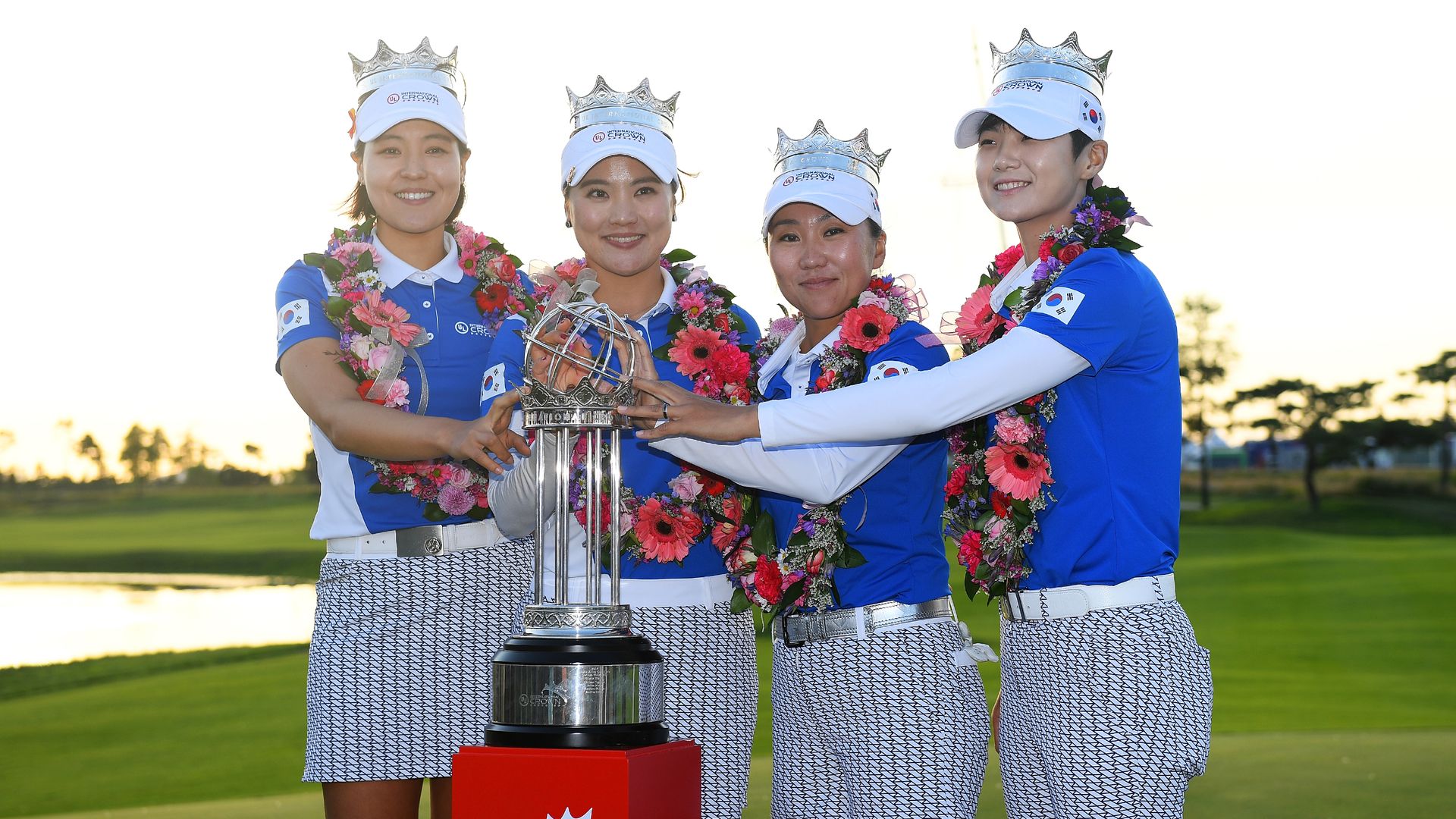 The South Korea team celebrate with the trophy after winning the tournament in 2018