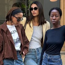 @erinoffduty in a graphic tee and suede jacket. @salome.mory in a grey tank and suede blazer. @sylviemus_ in a navy long-sleeve boatneck top. 