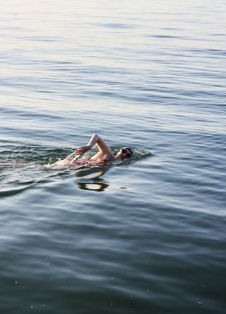 Woman wild swimming