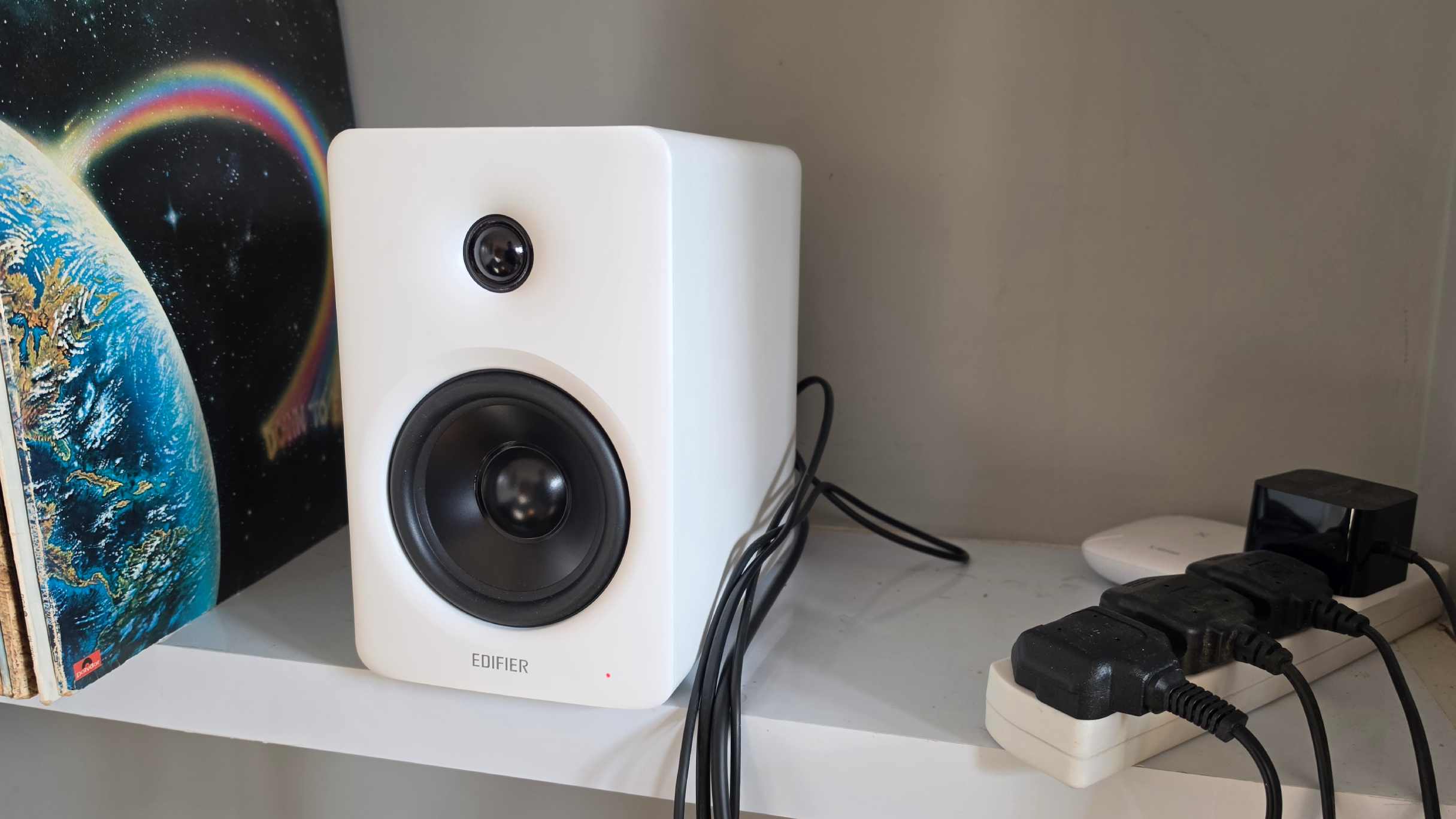 The main Edifier M90 unit, next to some records.
