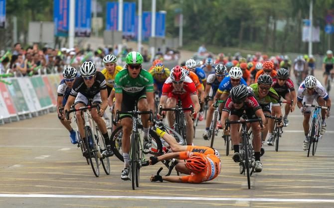Theo Bos wins ahead of the crash of Tom Palmer of Drapac, Andreas M&uuml;ller and Benedikt Kendler from KTM