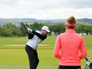 Amy Boulden spots that Dan Barlow's swing is a little flat at the top