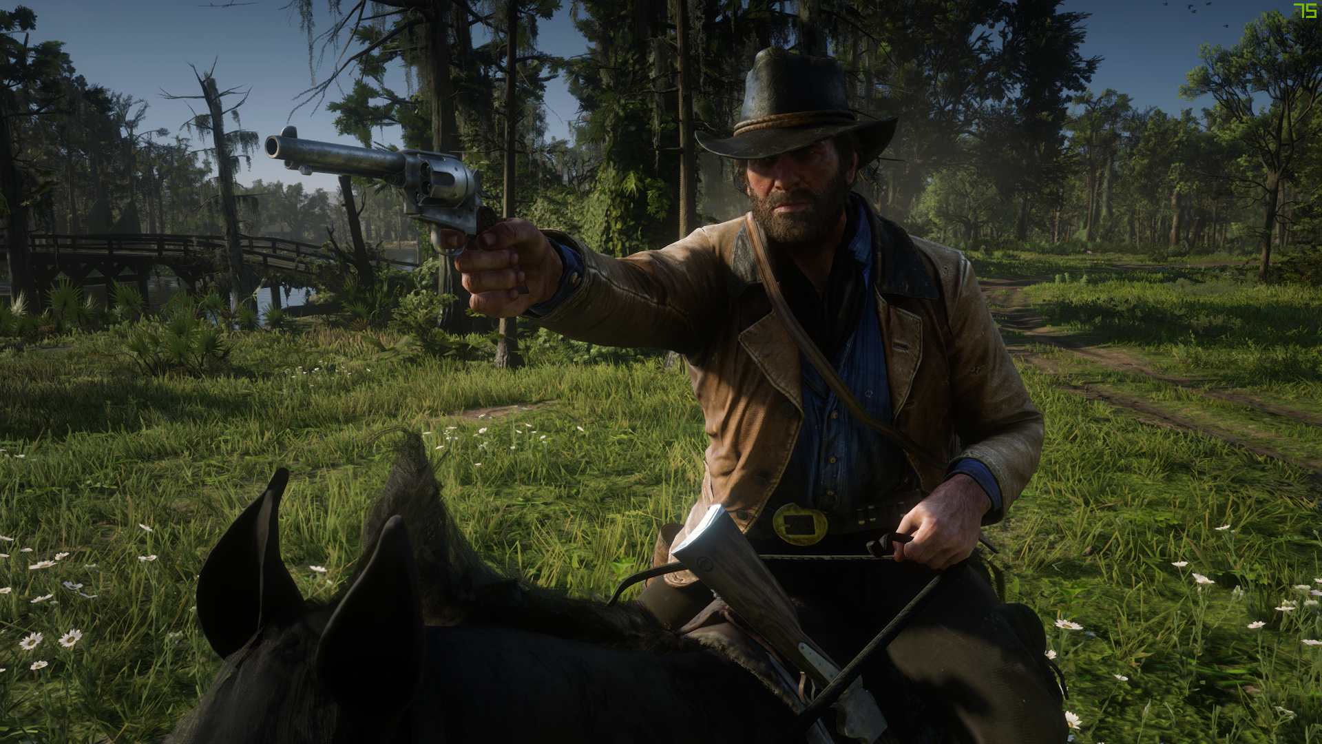 Red Dead Redemption 2 - Arthur Morgan rides on a horse and points a revolver postol past the camera.
