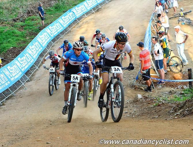 Markus Schulte-Luenzum takes the lead for Germany followed by Peter Disera (Canada)