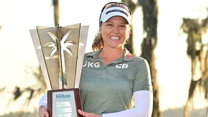 Brooke Henderson poses with the trophy after her win at the 2023 Hilton Grand Vacations Tournament of Champions
