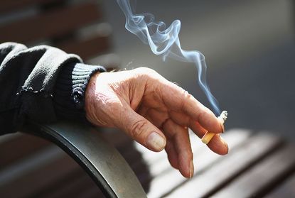 A man smokes.