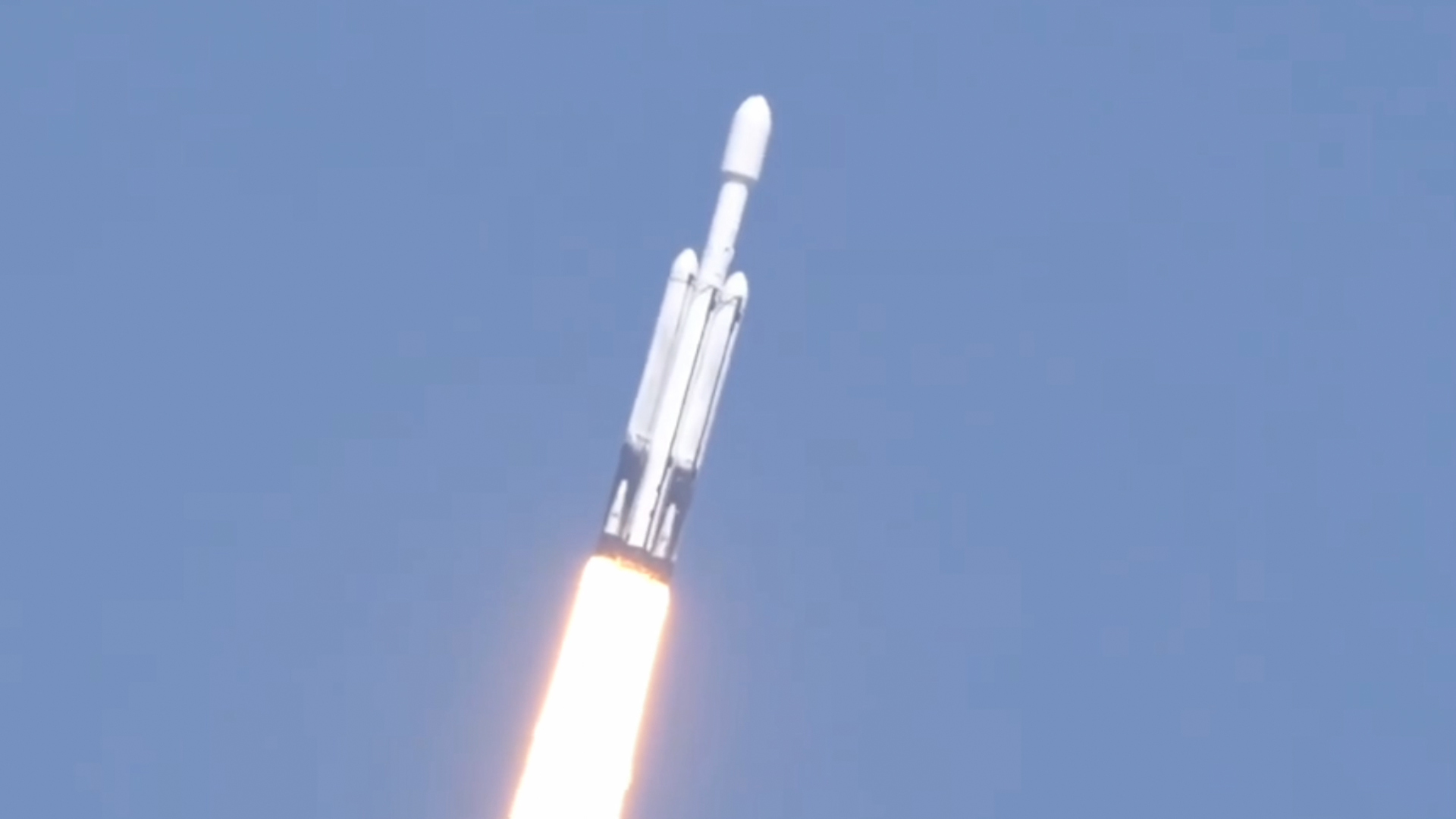 A three-core SpaceX Falcon Heavy rocket launches NASA's Europa Clipper spacecraft toward Jupiter from Pad 39A at NASA's Kennedy Space Center on Oct. 14, 2024.