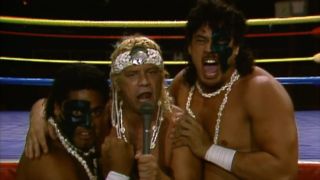 The Samoan SWAT Team giving interview ringside in the WWF