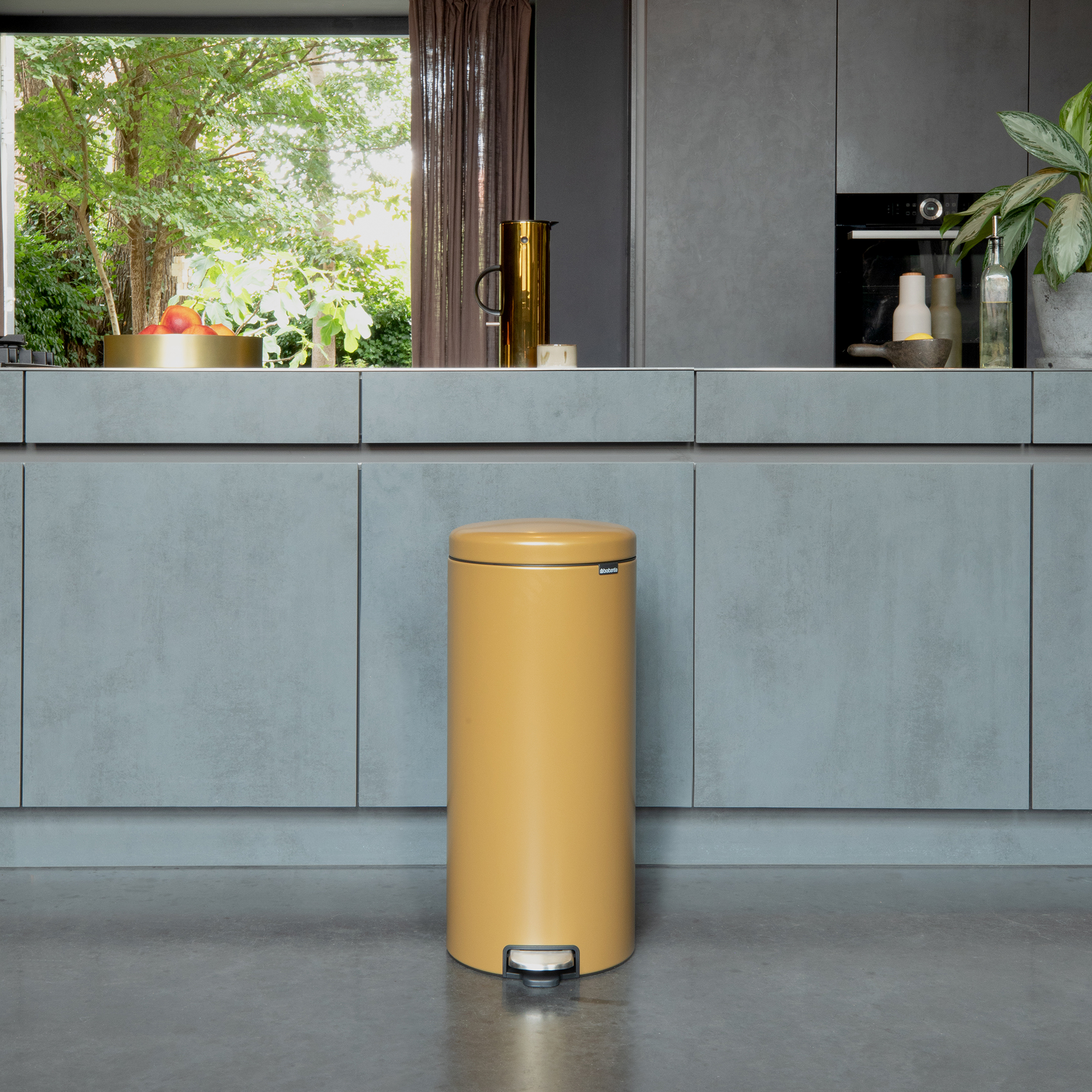 Brabantia coloured bins in kitchen