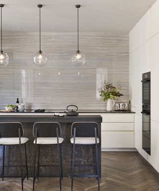 Small white kitchen ideas with white cupboards, black island with pendant lights
