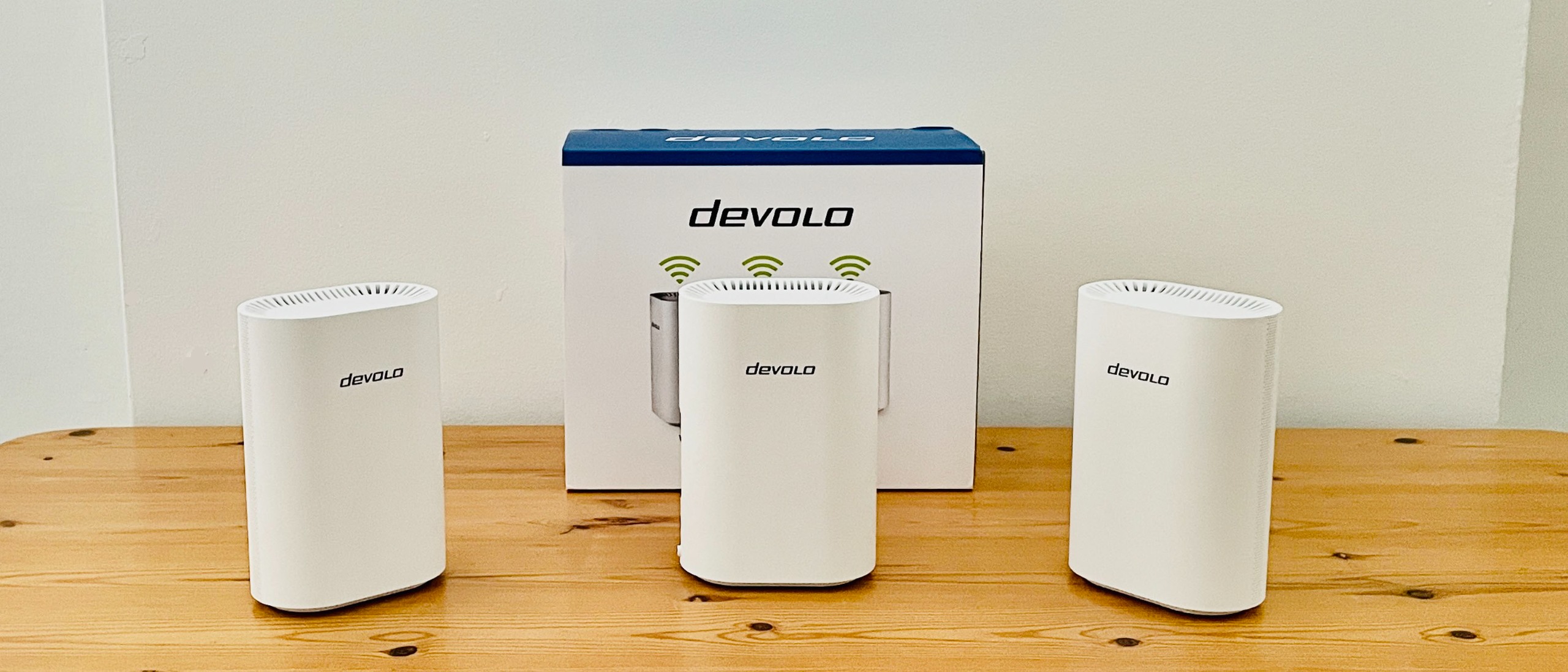 Devolo WiFi 7 Mesh BE6500 system on wooden table