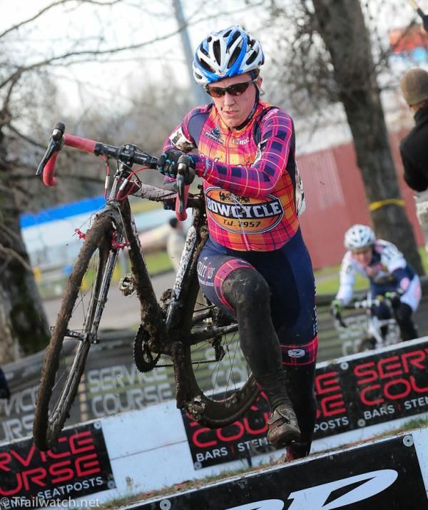 Katy Curtis (Bow Cycle) sprinting over the barriers