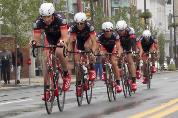 Jake Hollenbach leads Empire Cycling down the straightaway in formation.