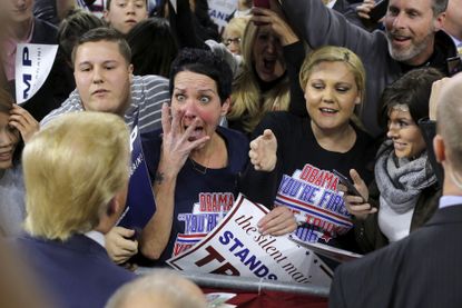 A woman reacts to meeting Donald Trump.