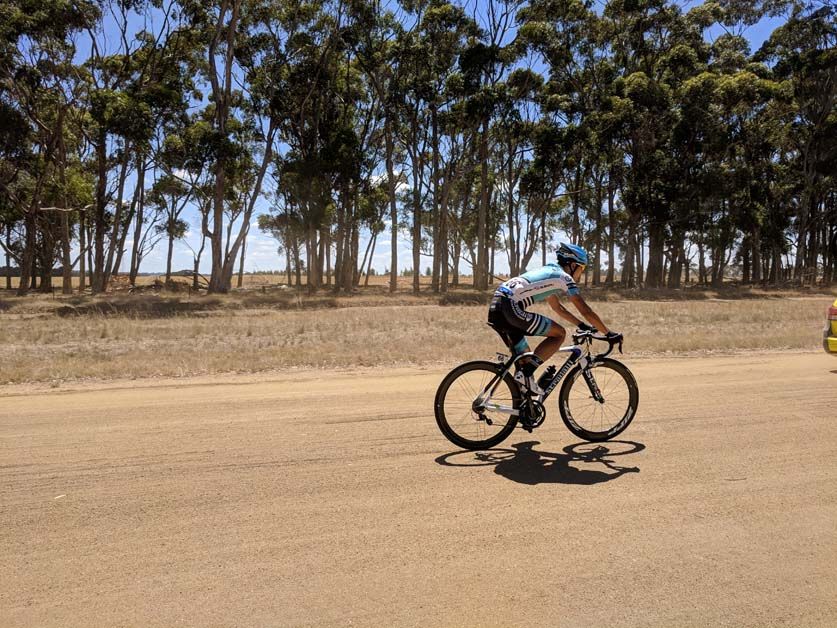 Yukinori Hishira (Interpro Stradalli Cycling) makes his way across the dirt roads