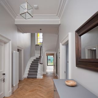 hallway with staircase and wooden flooring