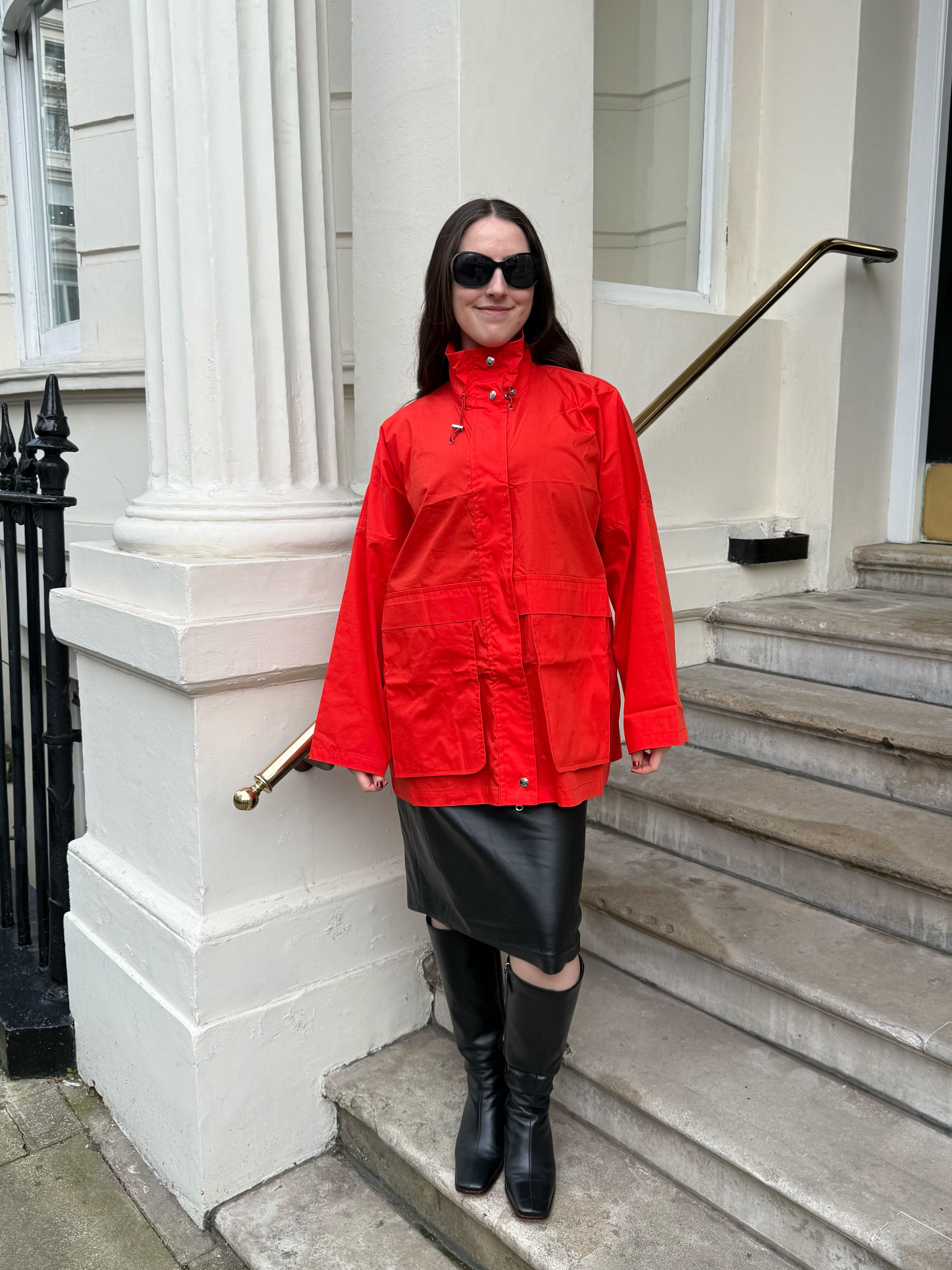 An image of Who What Wear UK SEO writer Ava Gilchrist wearing a Roucha raincoat.