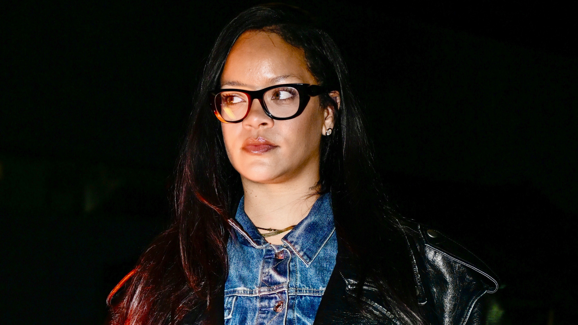 Rihanna wearing a leather trench coat for date night