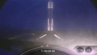 SpaceX's most-flown Falcon 9 booster stands atop the drone ship Of Course I Still Love You after a successful landing - its 9th so far - in the Atlantic Ocean on March 14, 2021.
