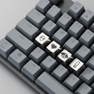 Susan Kare's Esc Keys collection in collaboration with Asprey Studio