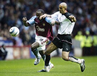 Rehman, right, played 21 times for Fulham in the Premier League between 2004 and 2006
