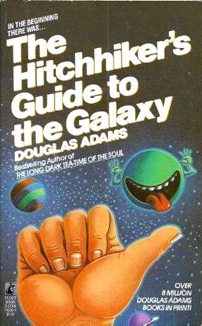 The Tesla Roadster's glove box contains a copy of the famed Douglas Adams novel "The Hitchhiker's Guide to the Galaxy.