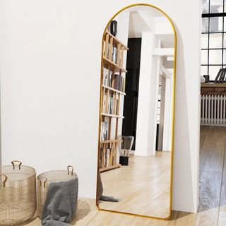 Arched modern floor mirror with Brass finish