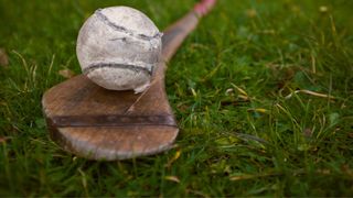 hurling stick and ball