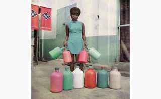 : Untitled #4 (Sick-Hagemeyer shop assistant, Accra), by James Barnor