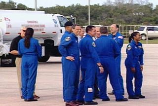 Discovery Shuttle Astronauts Arrive at NASA Spaceport