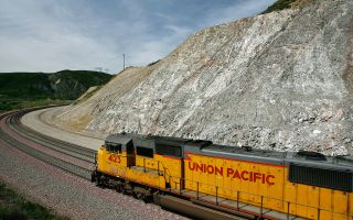 SAN BERNARDINO, CA - MAY 15:A freight train passes diagonally-shifted layers of earth as it crosses the San Andreas Rift Zone, the system of depressions in the ground between the parallel fau