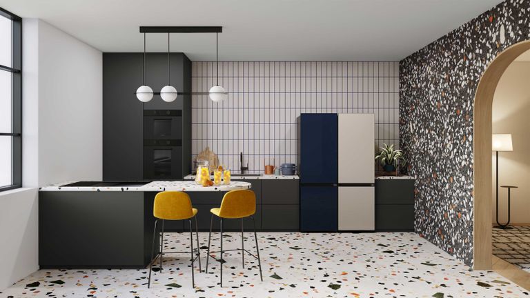 samsung glam navy fridge in a midcentury modern kitchen with terazzo tiles and statement lighting