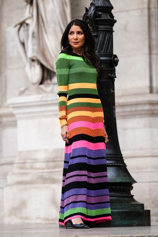 woman in colorful striped dress