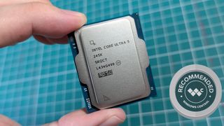 Intel Core Ultra 5 245K held in front of cutting mat