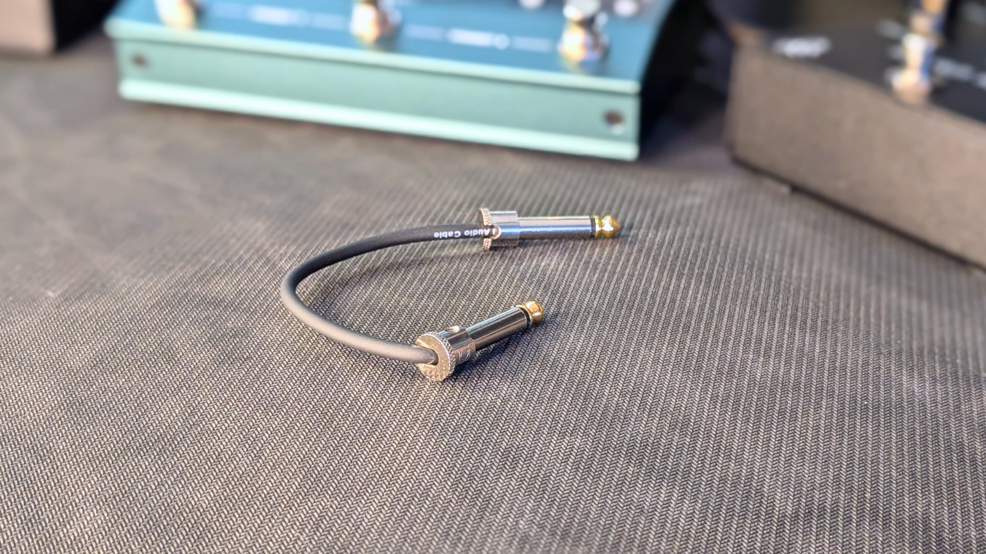 A Boss BCK-24 Solderless patch cable on a desk