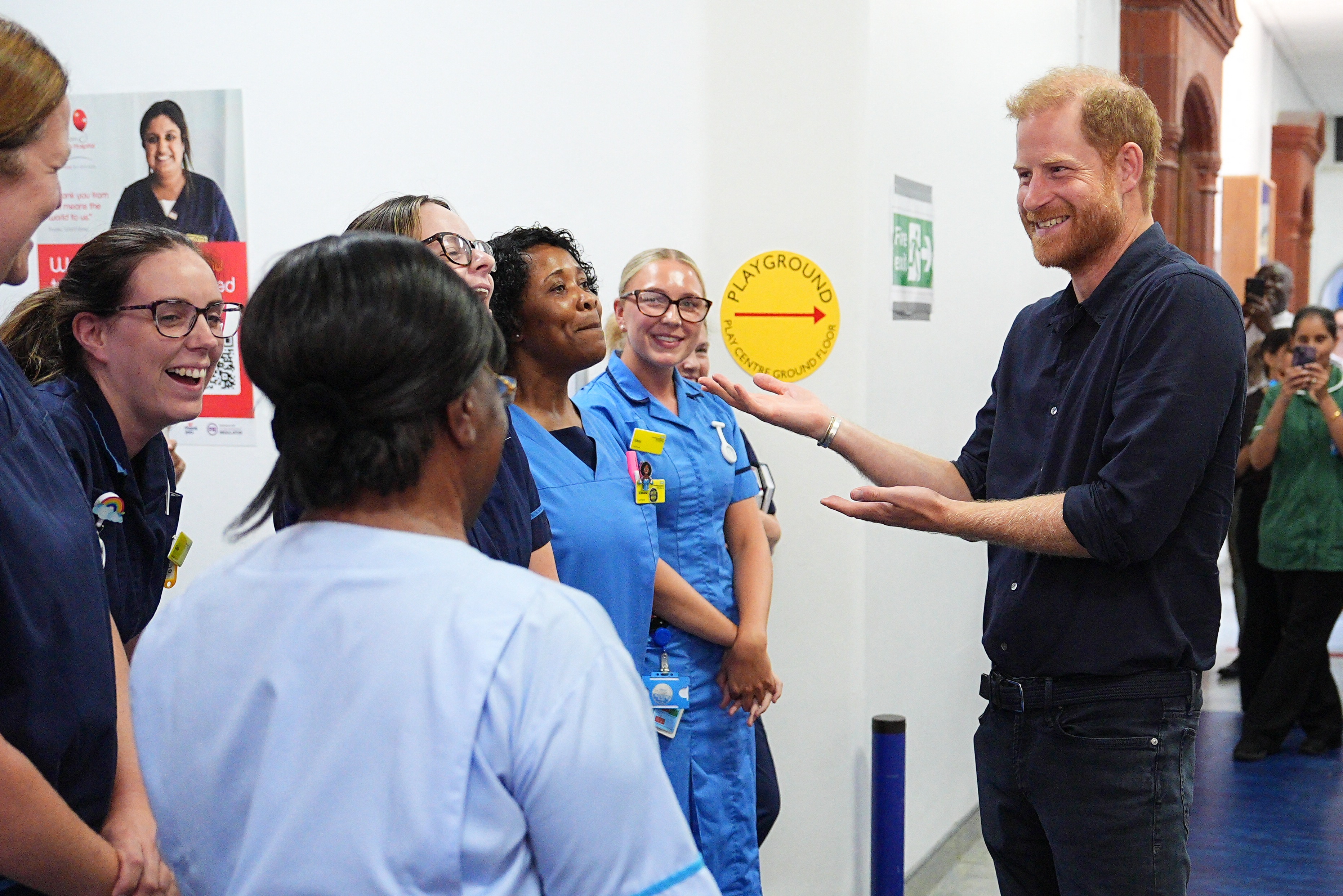 Prince Harry visits Birmingham Children's Hospital where he meets a young patient who loved Lego, just like his son Archie