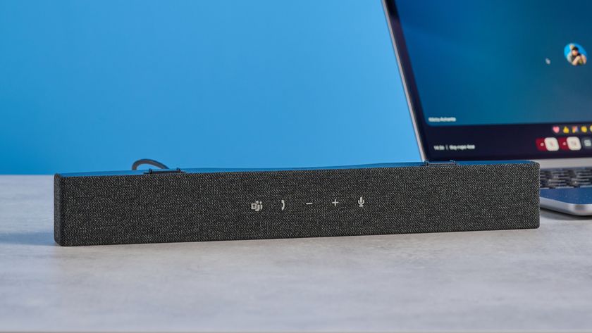 Dell SB725 computing conference soundbar photographed on a blue background