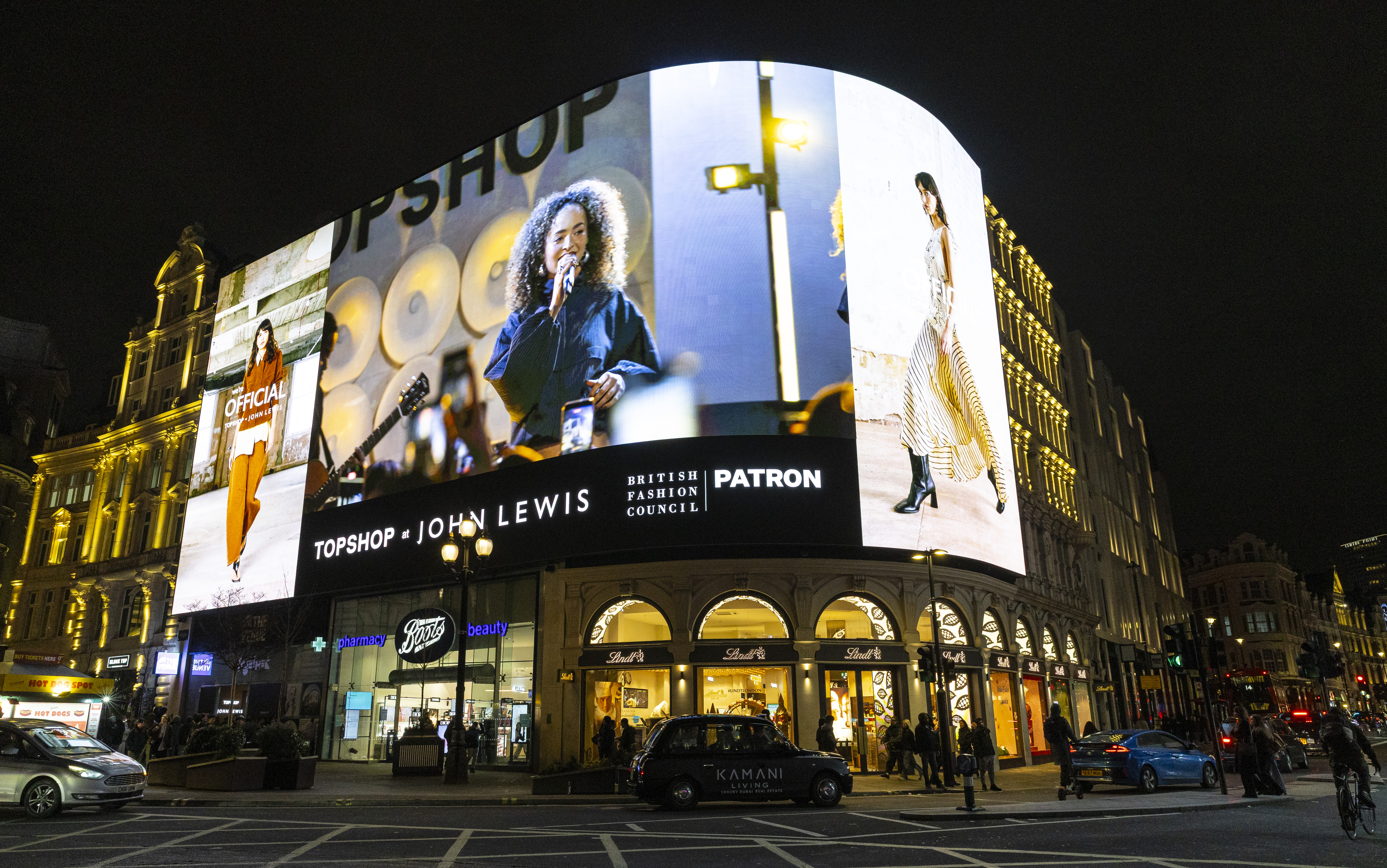 ella eyre performing for topshop x john lewis party displayed in piccadilly circus