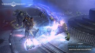 Titus hits an Ork with a hammer in Warhammer 40,000: Space Marine Master Crafted Edition