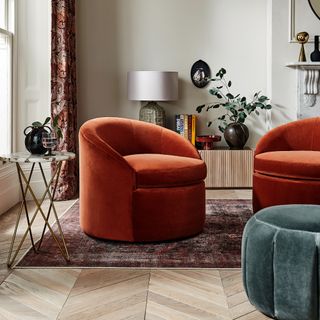 Sofa.com Quinn Swivel Armchair in Moroccan Spice in a living room